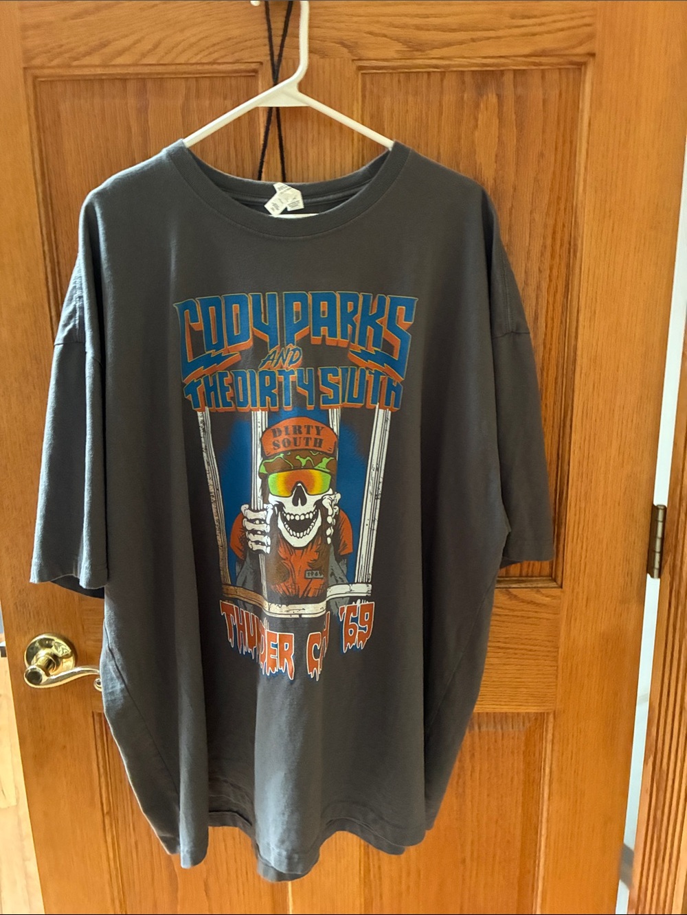 Bella Canvas Charcoal Band Graphic Tee with Orange and Blue Print Cody Parks